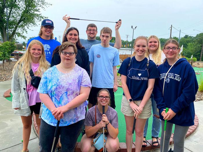 One of the many activities of We Are Friends was a mini golf outing.